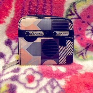 LeSportsac Zipper Detail with Purple and Yellow Accents